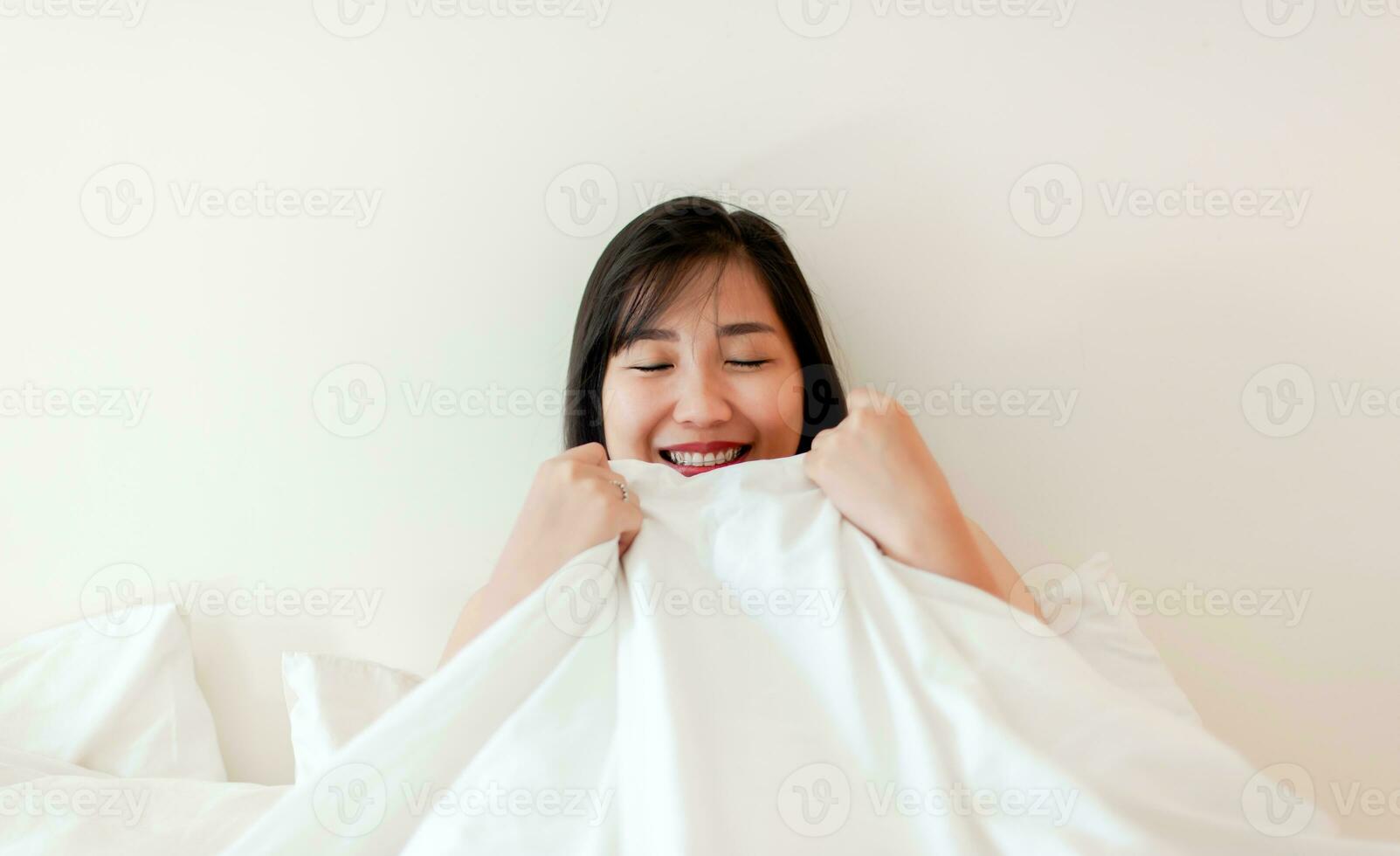 Wake up happy in the morning in bed Enough rest, full sleep, and a smile full of happiness. happy bedroom photo