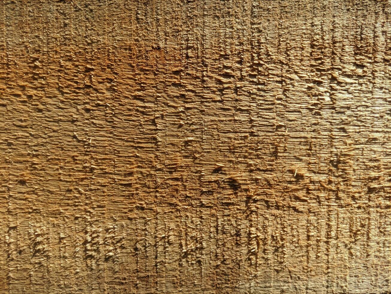 Wooden grain texture with scratches and cracks. Dark wood texture background surface with old natural pattern. Abstract wooden texture background for design. photo