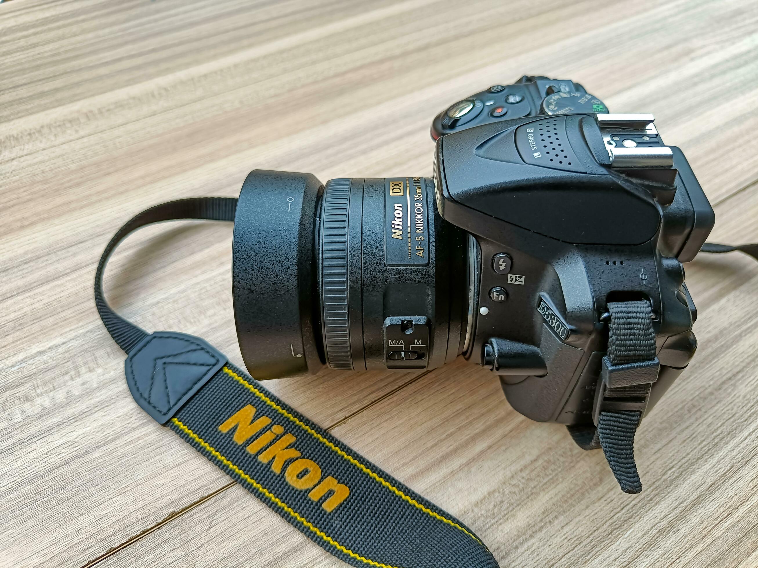 New Delhi, India, May 28 2023 - Nikon D5300 camera with 35mm f2.8 prime  lens on plain background, Nikon DSLR camera shoot 24680110 Stock Photo at  Vecteezy