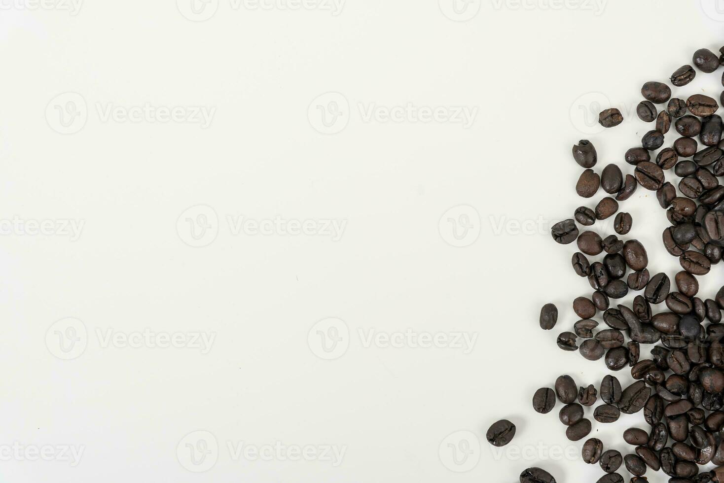 top view of coffee beans on white table photo