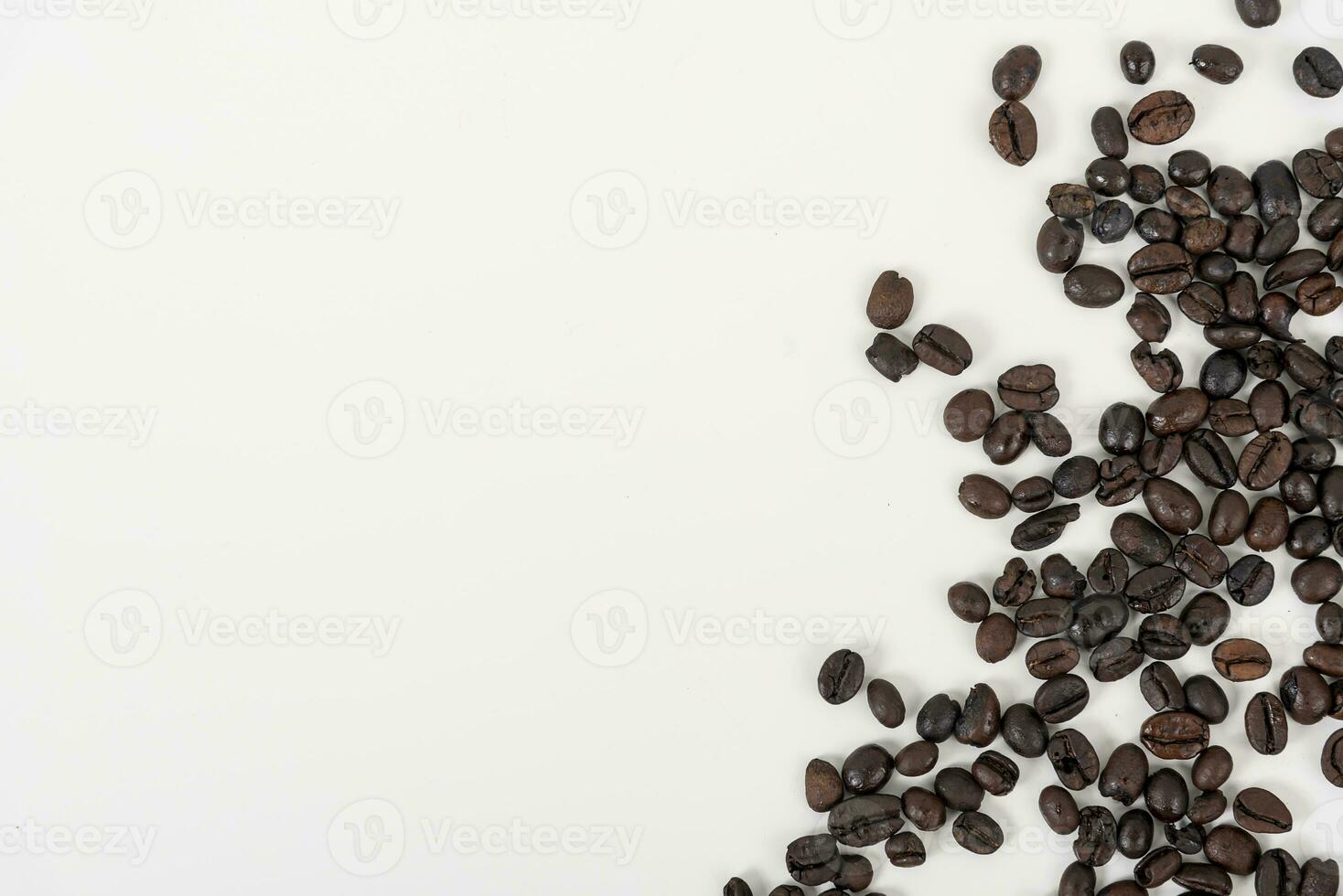top view of coffee beans on white table photo