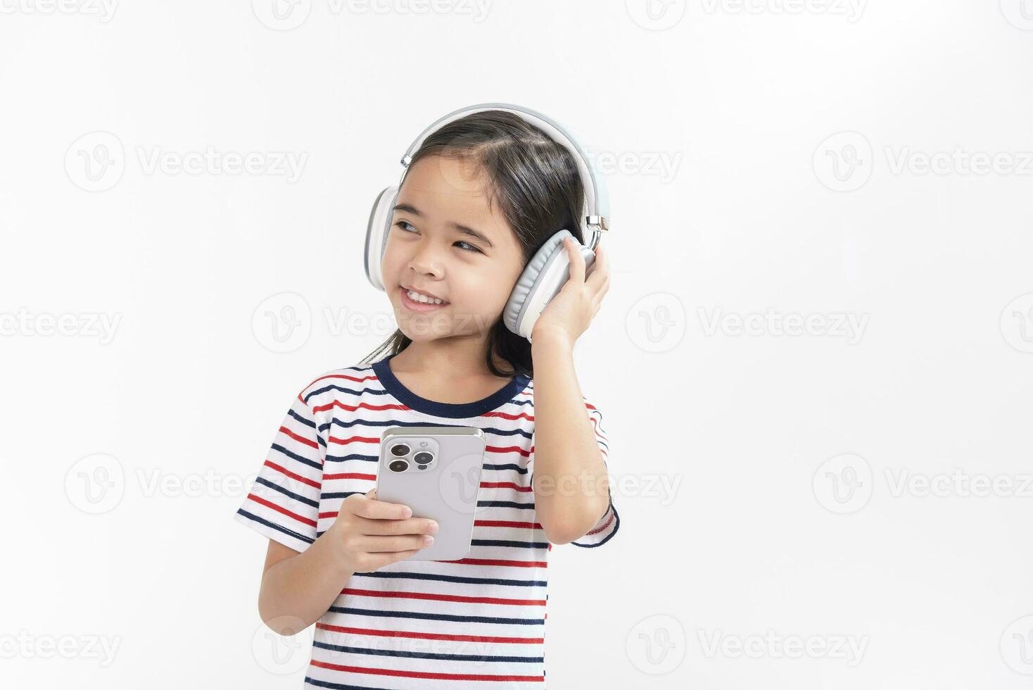 Little girl play phone mobile. Isolated on white background photo