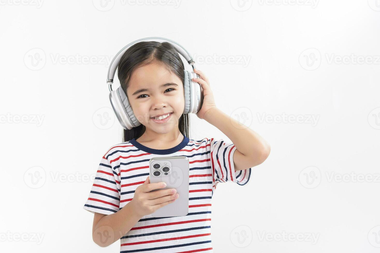 Little girl play phone mobile. Isolated on white background photo