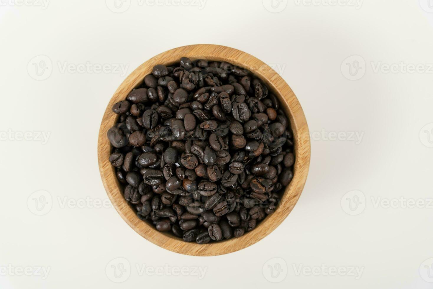 top view of coffee beans on white table photo