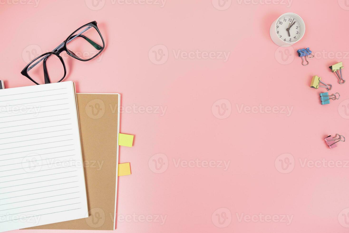 Pink office desk table Top view with copy space. Flat lay. photo