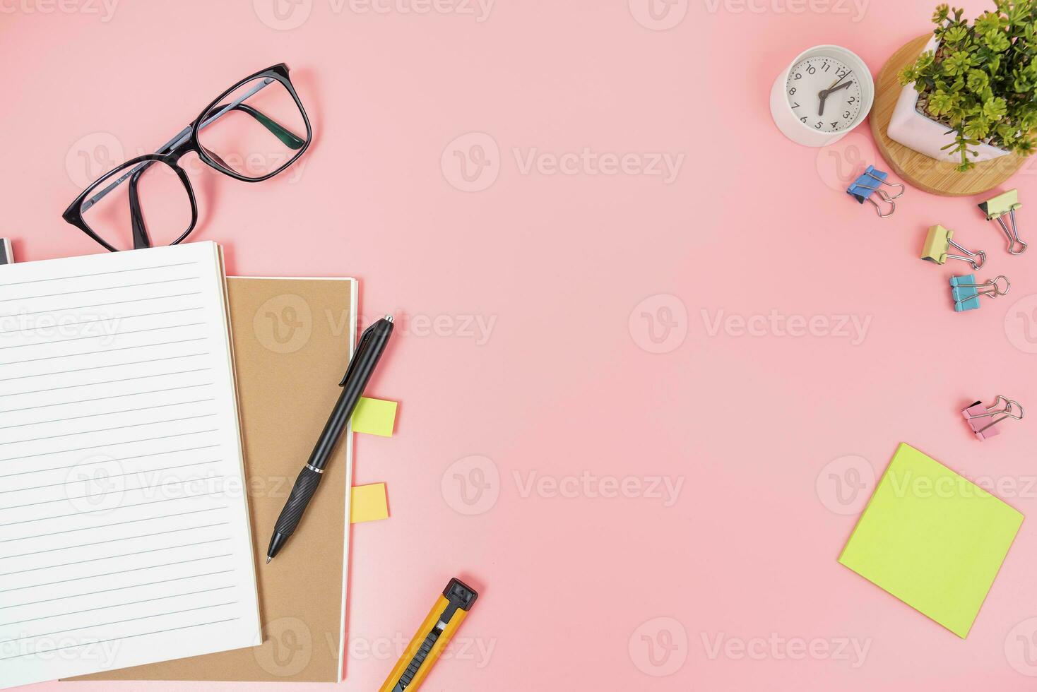 Pink office desk table Top view with copy space. Flat lay. photo
