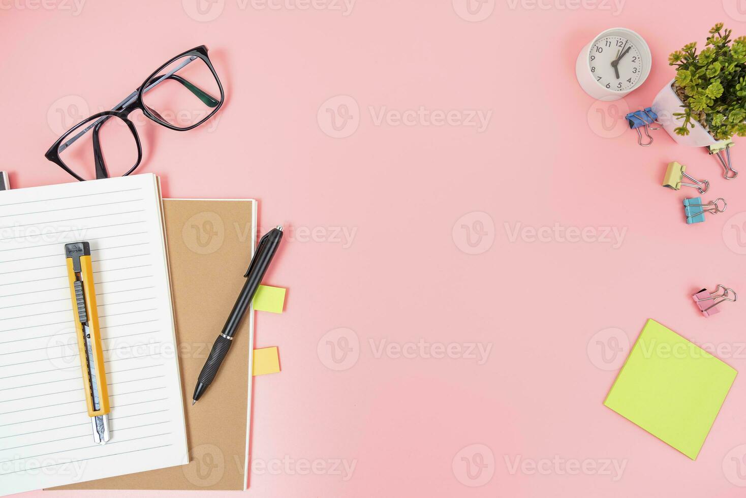 Pink office desk table Top view with copy space. Flat lay. photo