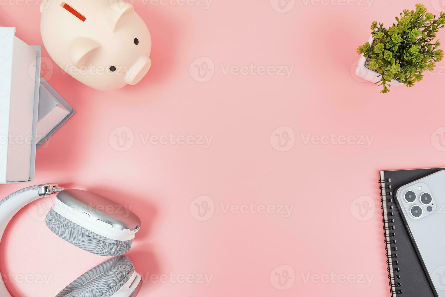 Pink office desk table Top view with copy space. Flat lay. photo