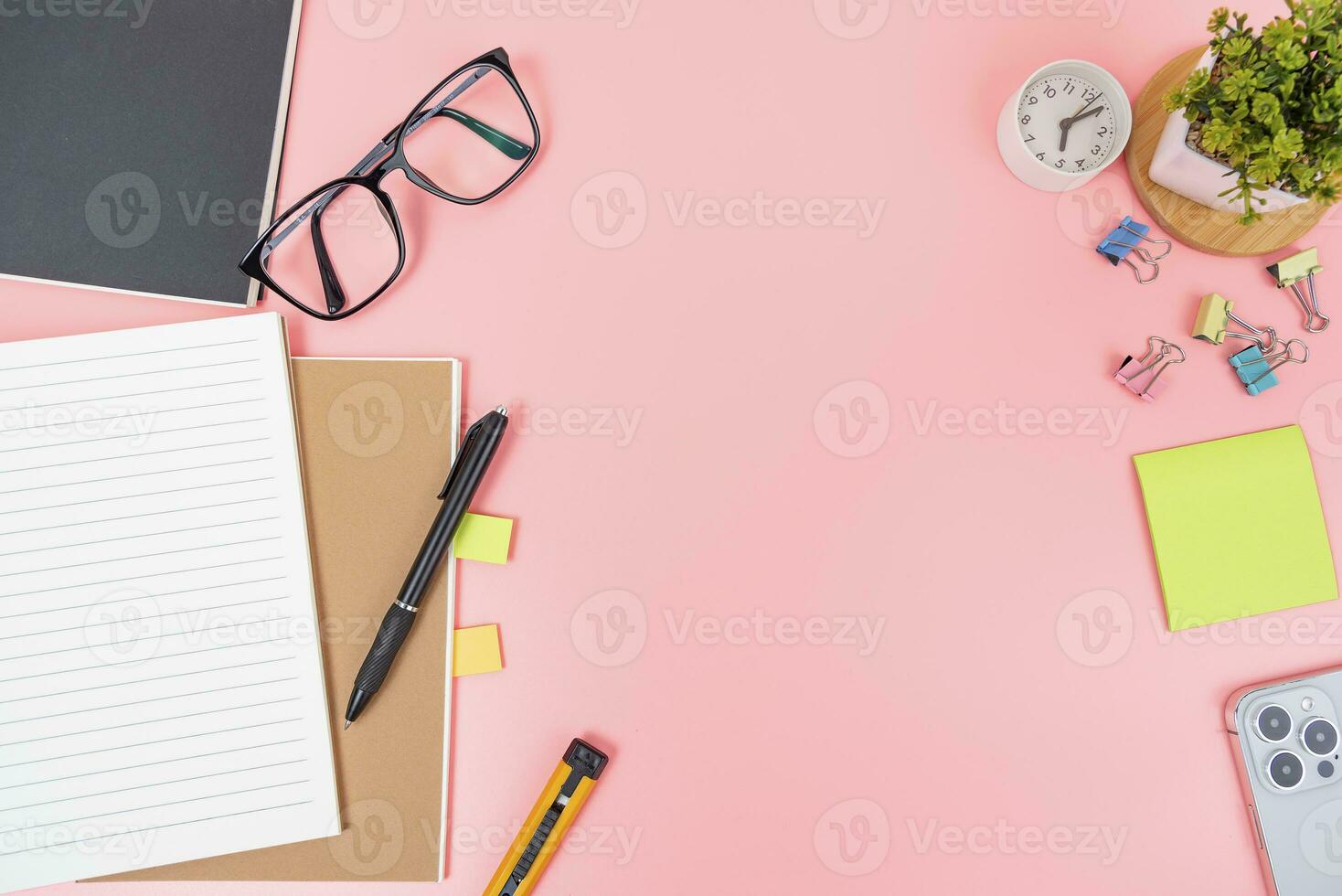 Pink office desk table Top view with copy space. Flat lay. photo