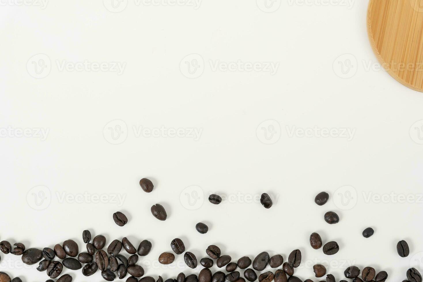 top view of coffee beans on white table photo