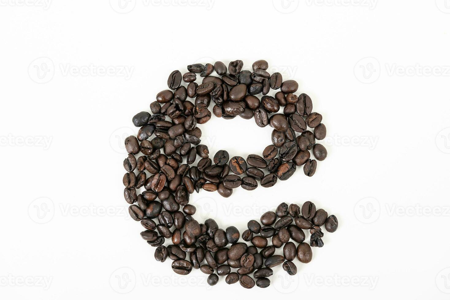 top view of coffee beans on white table photo