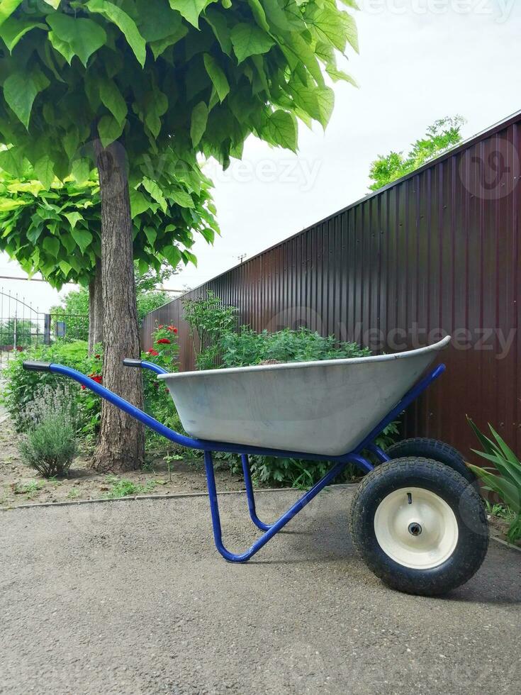 garden or steel construction on two wheels for the carriage of cargo photo