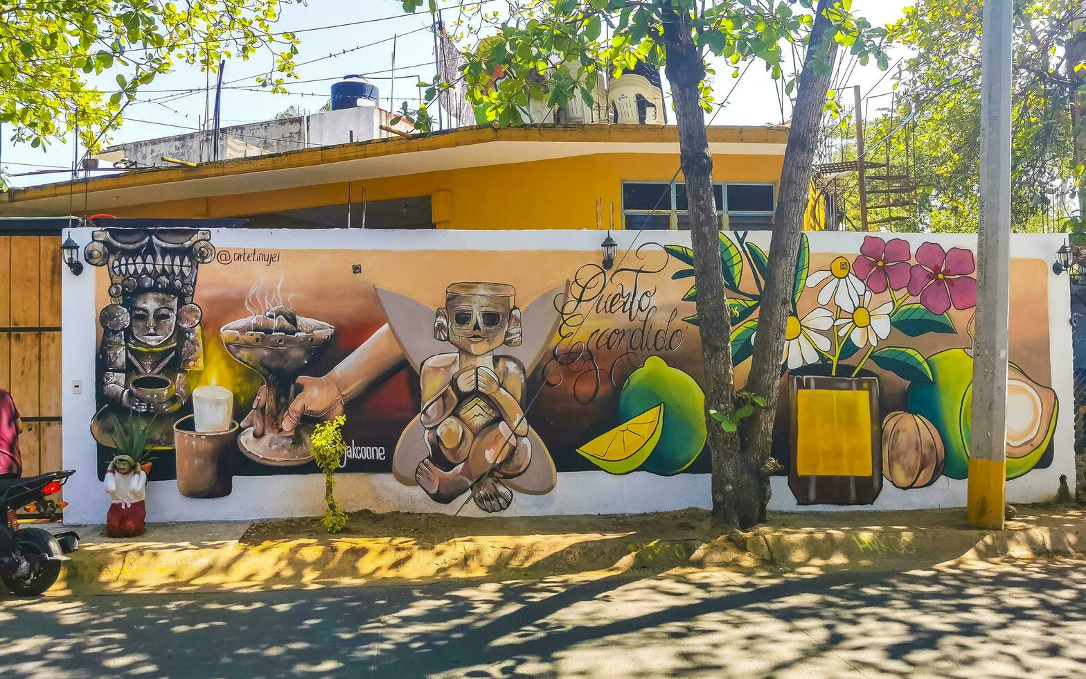Puerto Escondido Oaxaca Mexico 2023 Wall with azteca maya graffiti art drawings paintings in Mexico. photo