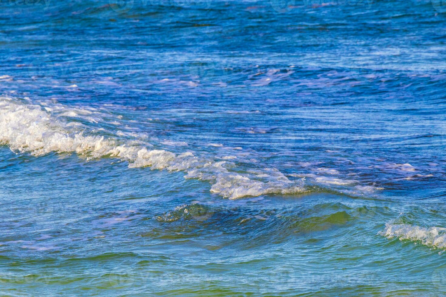 Waves at tropical beach caribbean sea clear turquoise water Mexico. photo