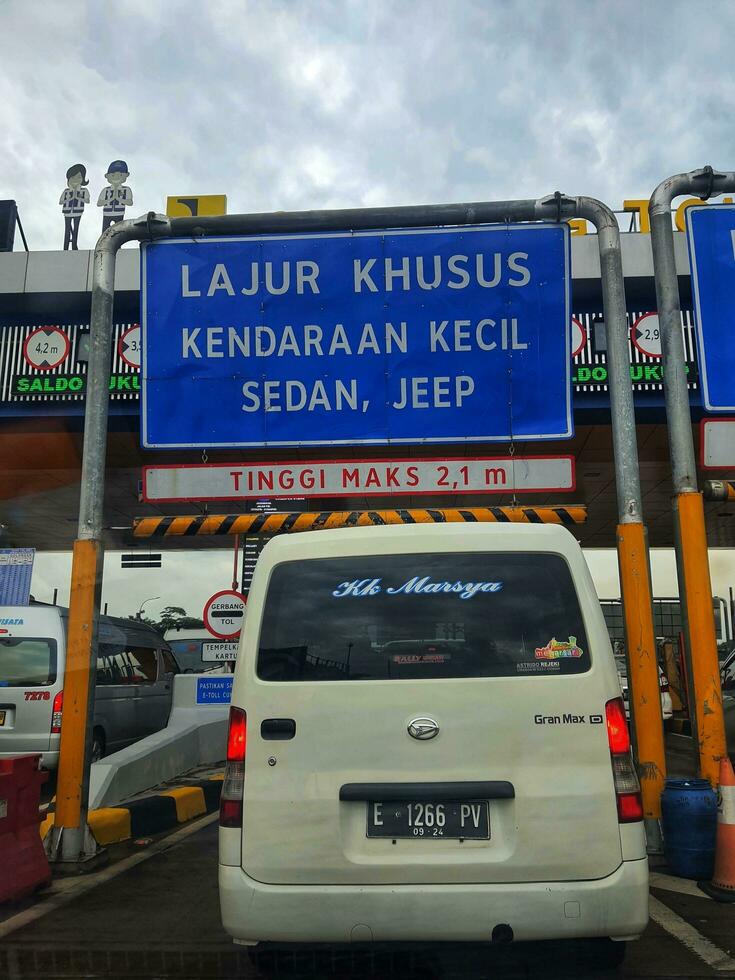 Cikampek, Indonesia in November 2022. The queue of cars that will enter the Cikampek Utama toll gate. photo