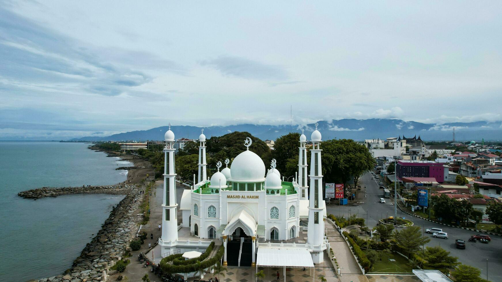 Aerial view of Al-Hakim Mosque Largest Masjid in Padang, Ramadan Eid Concept background, Beautiful Landscape mosque, Islamic background Mosque, Travel and tourism. Padang, Indonesia, January 26, 2023 photo