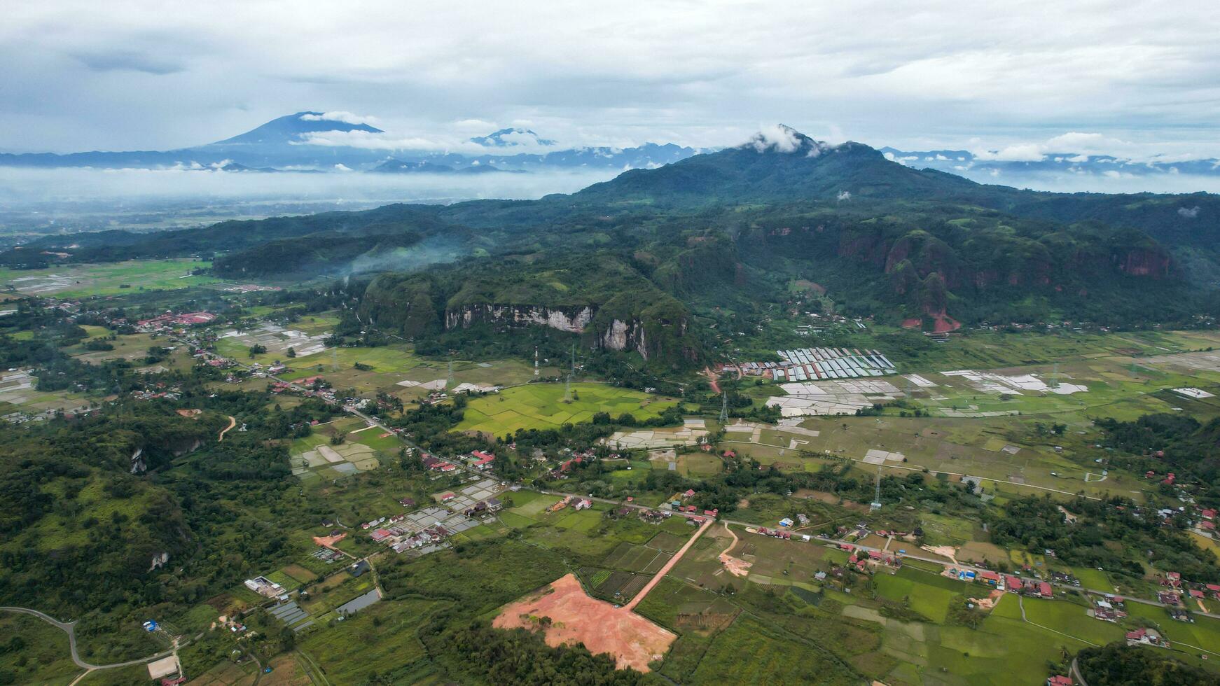 Aerial view of a beautiful landscape view of Harau Valley with mountains valley and grass view, Beautiful Minangkabau. West Sumatera, Indonesia, january 26, 2023 photo