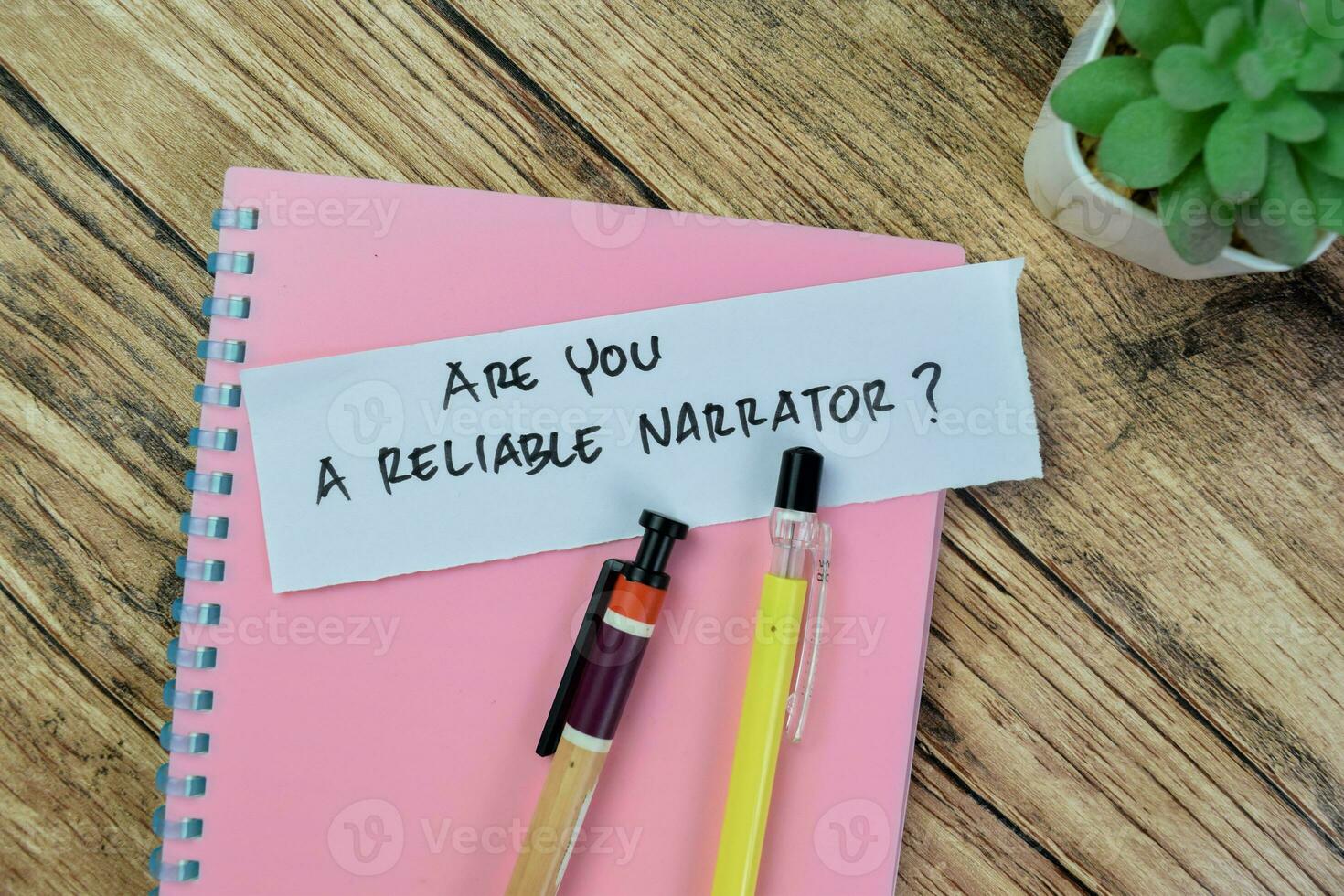 Concept of Are You A Reliable Narrator write on sticky notes isolated on Wooden Table. photo