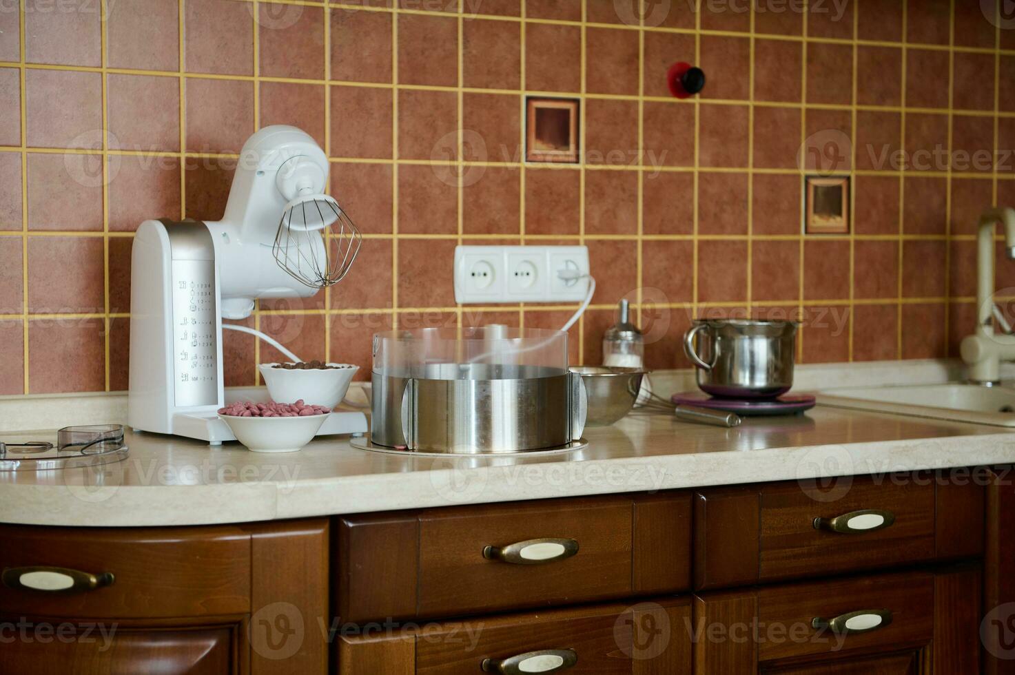 Stylish luxury cozy wooden home kitchen in a rustic old style in warm colors. Home interior design. Still life. photo