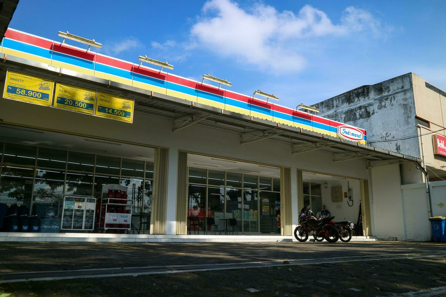 Yogyakarta, Indonesia - March 18 2023 - a mini market brand that provides daily necessities of life. PT Indomarco Prismatama or Indomaret is a chain of retail convenience stores. photo