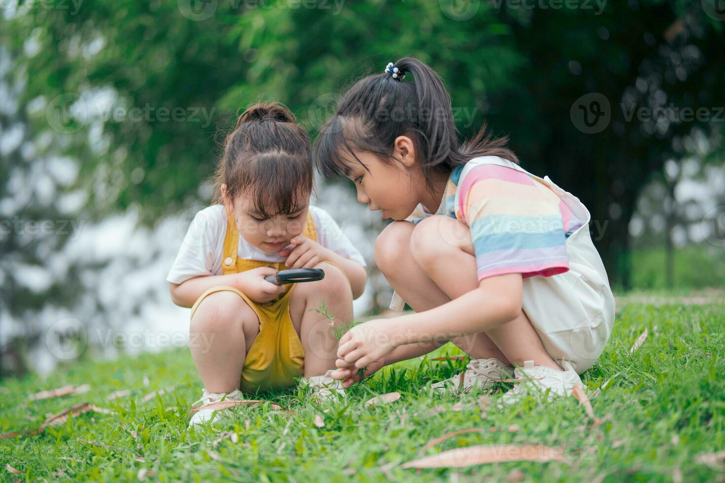 Photo of young Asian baby girl playing at park