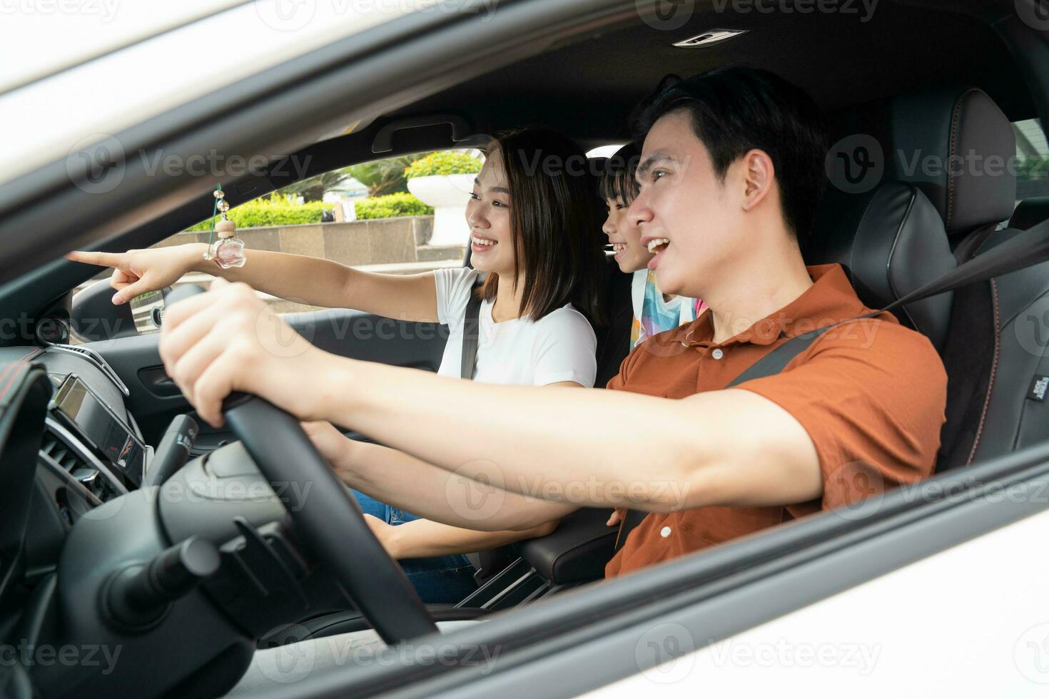 Image of young Asian family travel photo