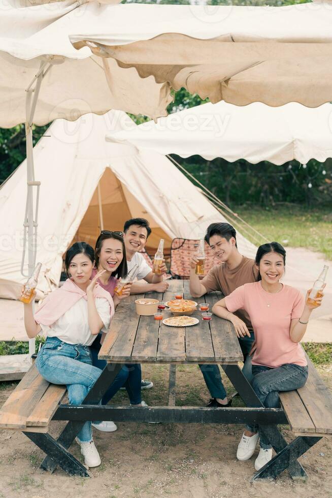 Group Asian people picnic outside photo