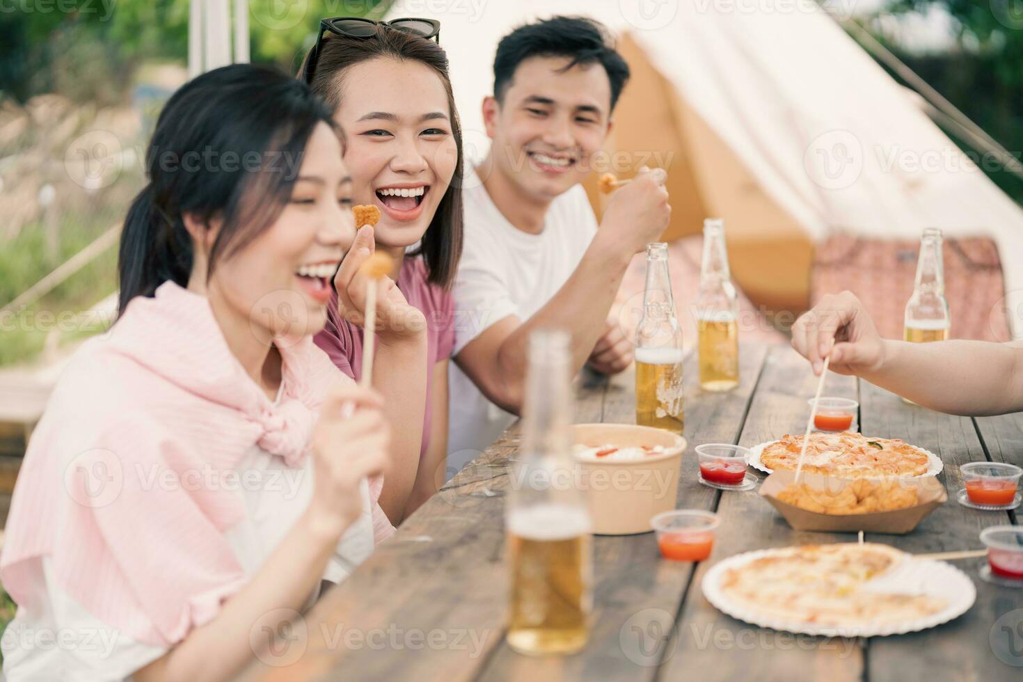 Group Asian people picnic outside photo