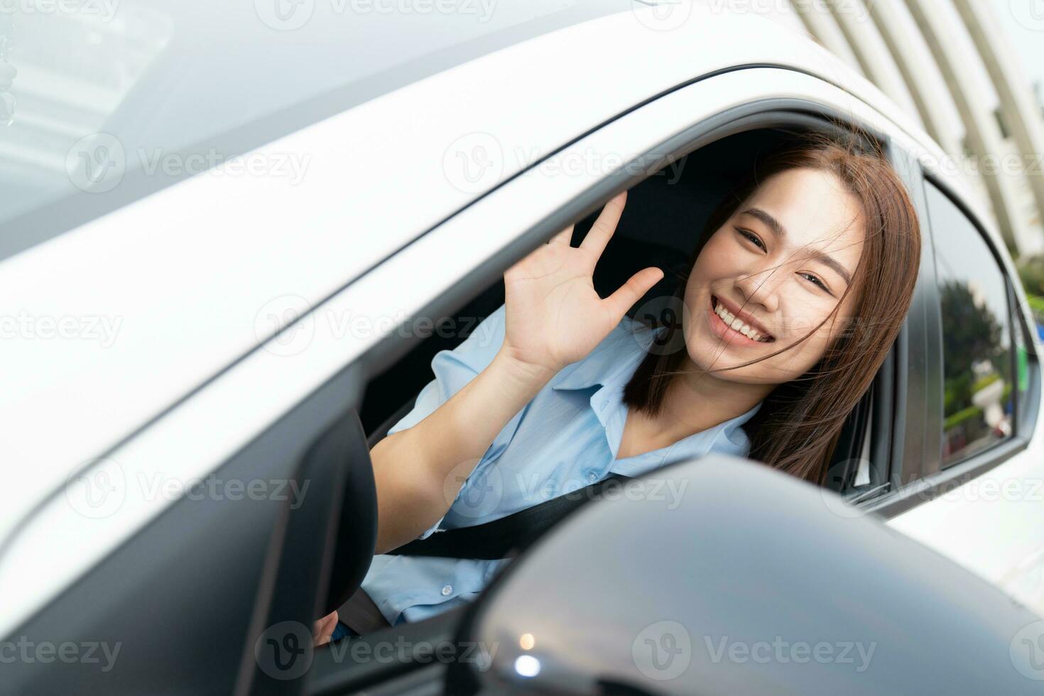 Young Asian woman with car photo