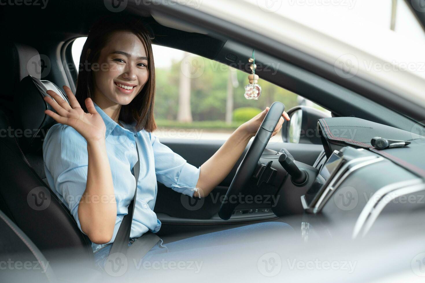 Young Asian woman with car photo