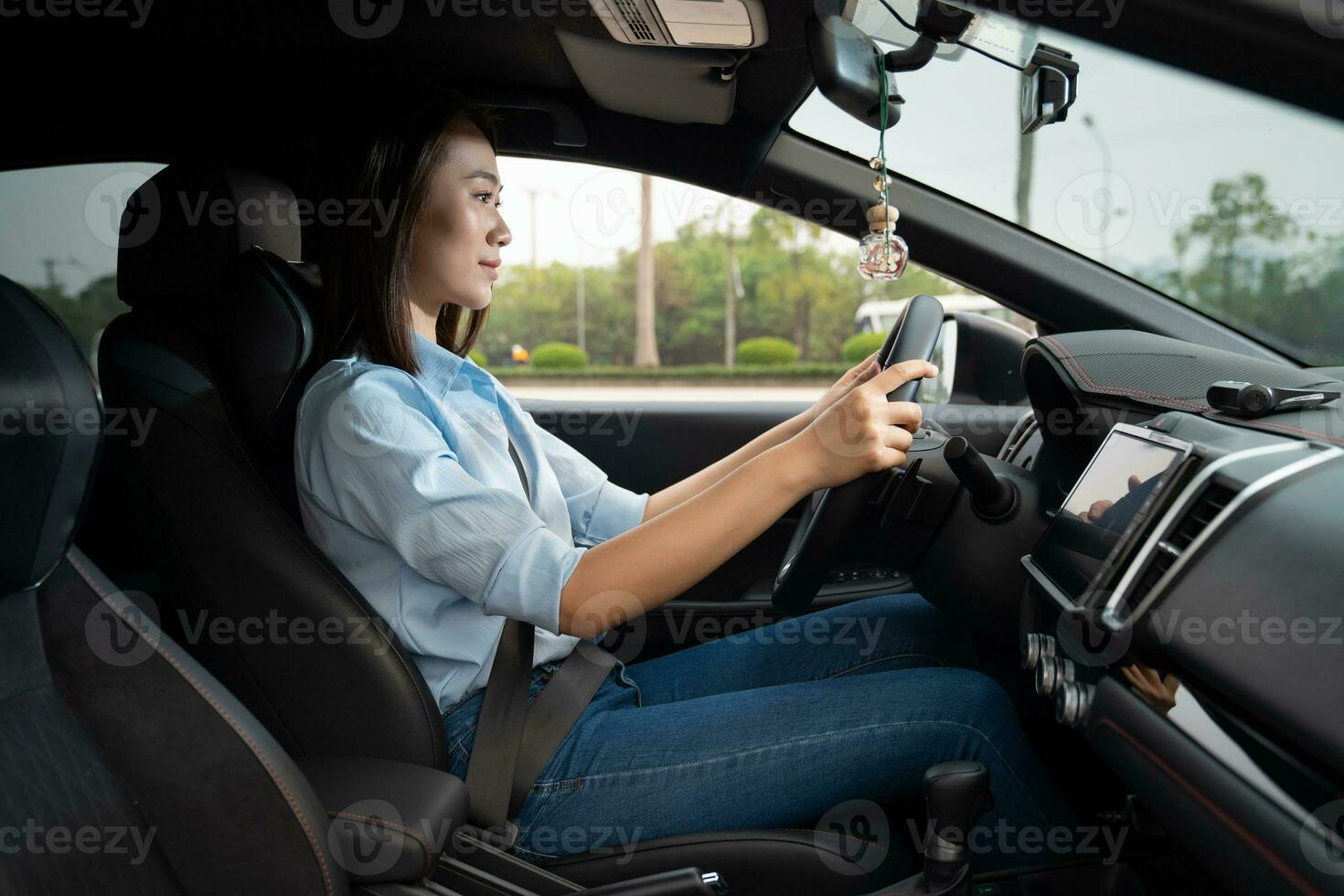 Young Asian woman with car photo