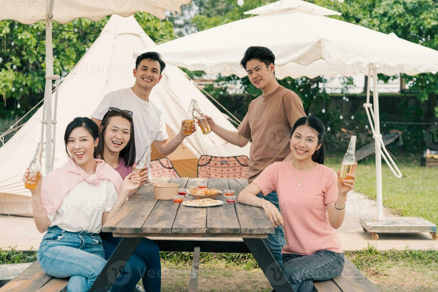 Group Asian people picnic outside photo