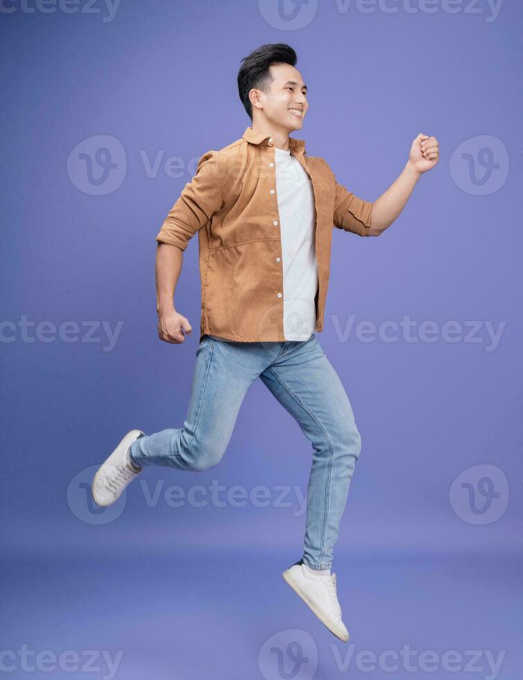 Photo of young Asian man on background
