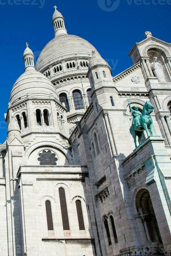 The Sacre Coeur Basilica at the Montmartre hill in Paris France photo