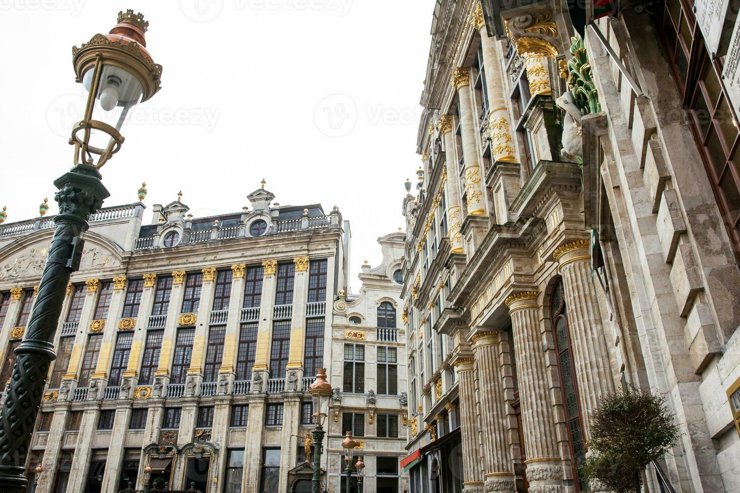 Facade of the historic guild houses of the Grand Place in Brussels built in the fourteenth century photo