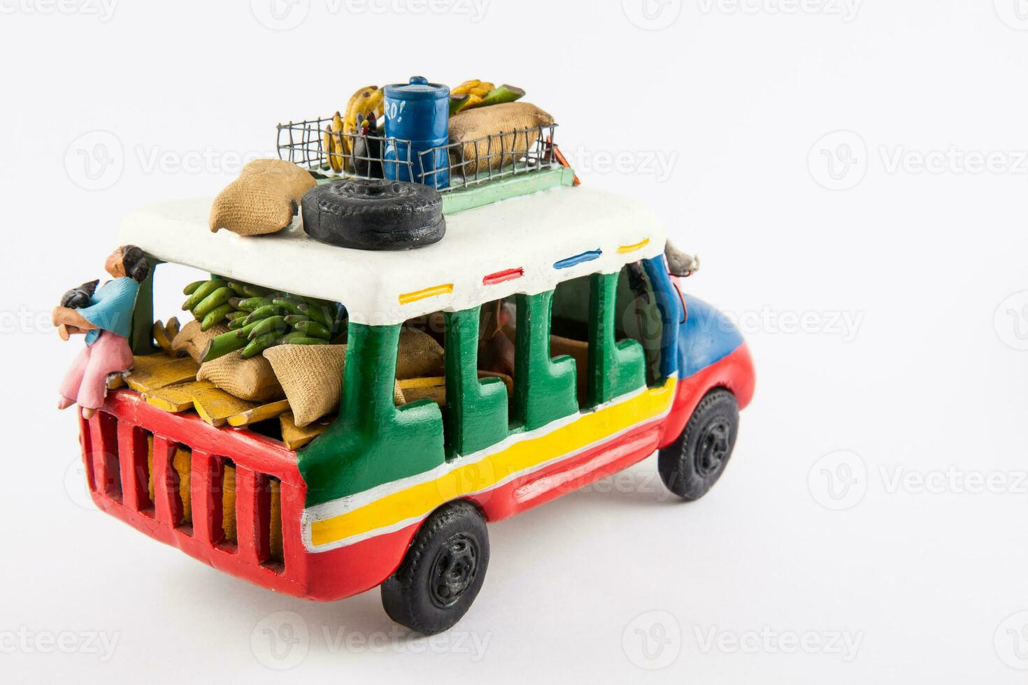 Colorful traditional rural bus from Colombia called chiva isolated on white background photo