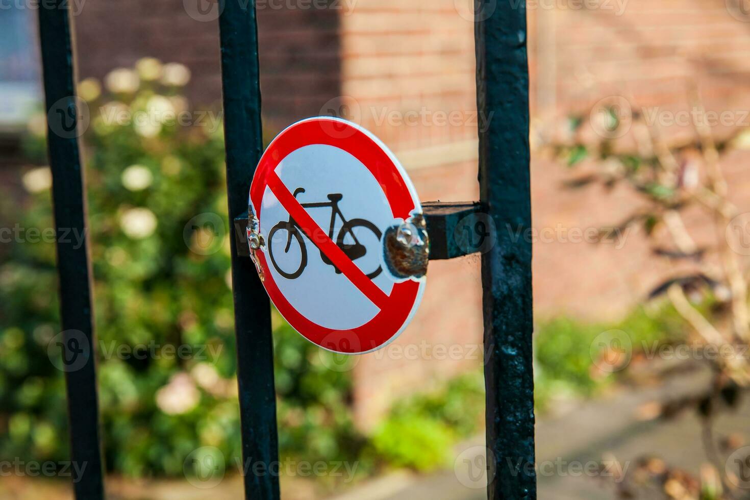 Do not lock bicycles here sign at a fence at the Museum Square in Amsterdam photo