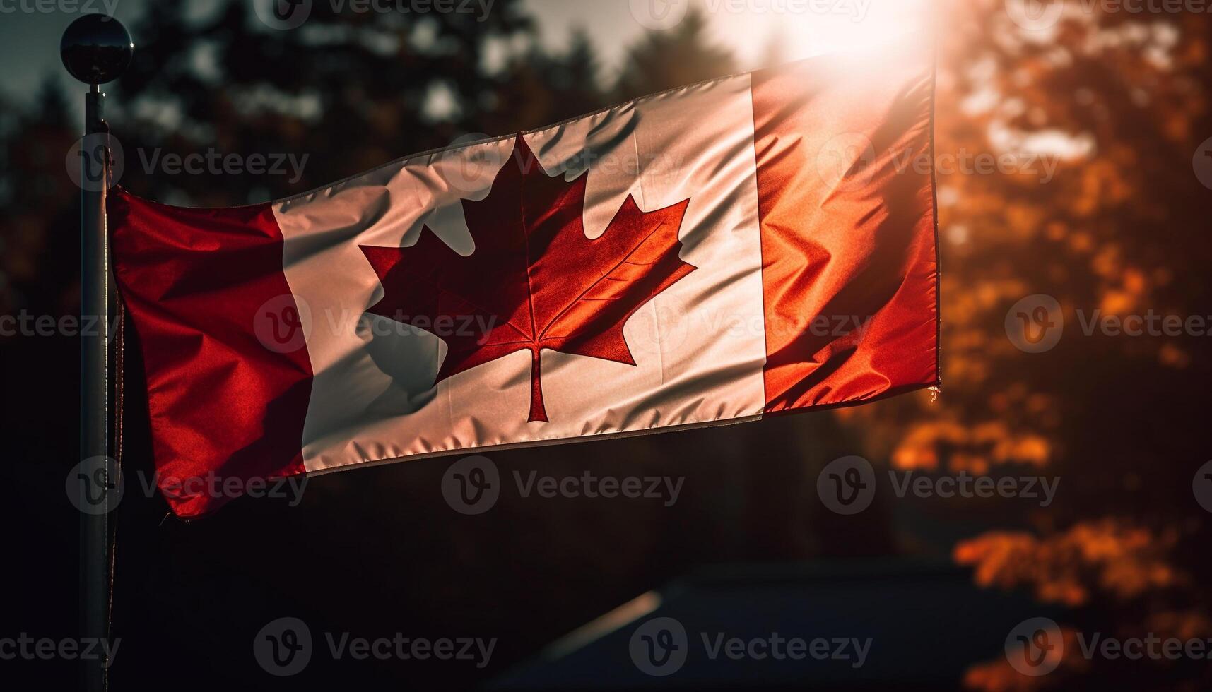 Canadian flag waves proudly in autumn sunlight photo