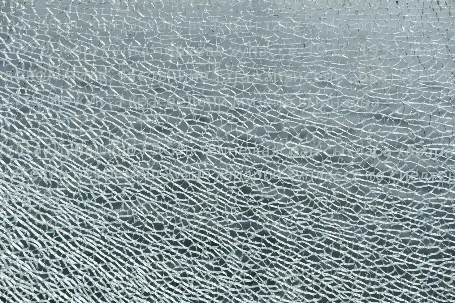 background and texture of broken glass fragments photo