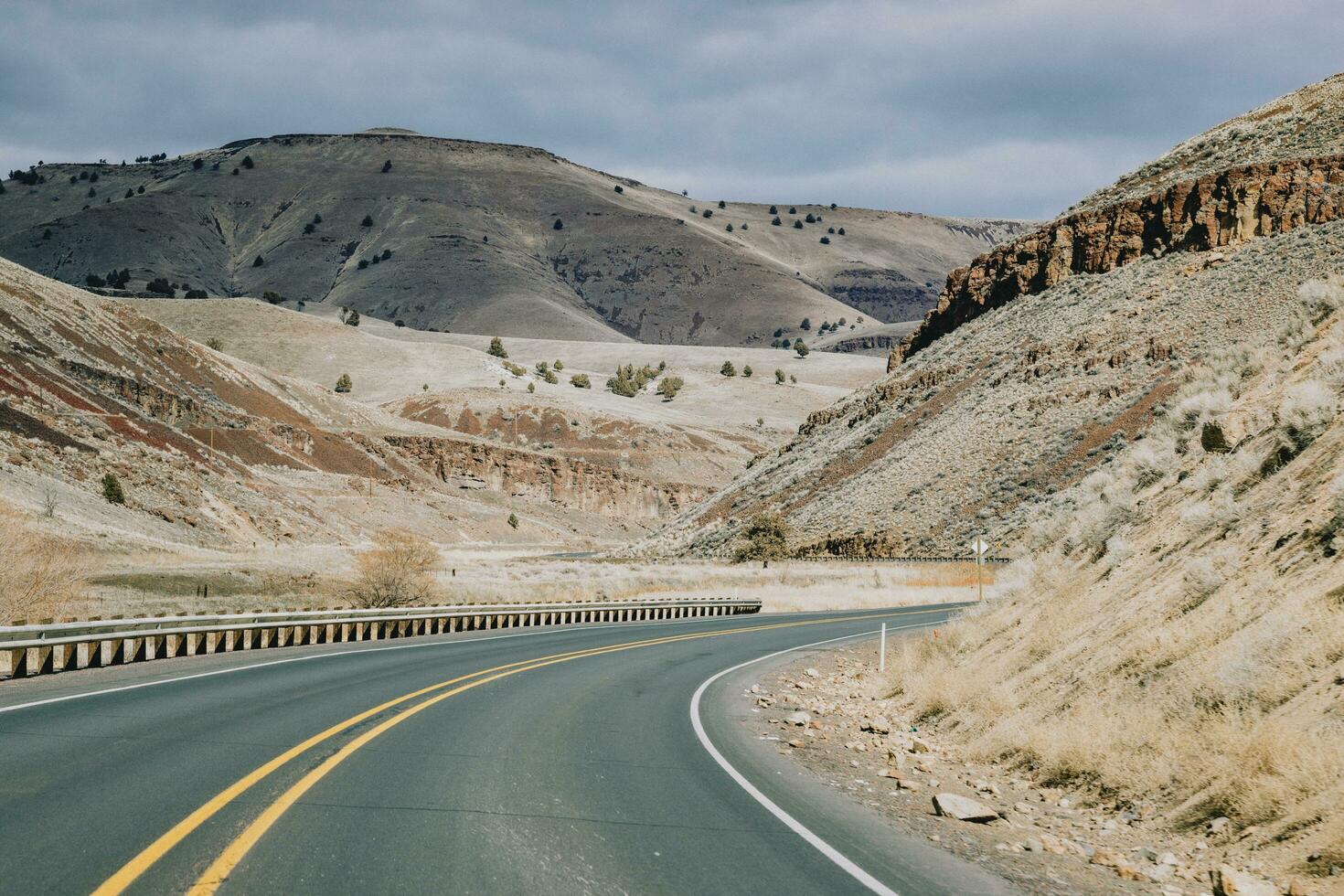 Road in Eastern Oregon going through the canyon photo