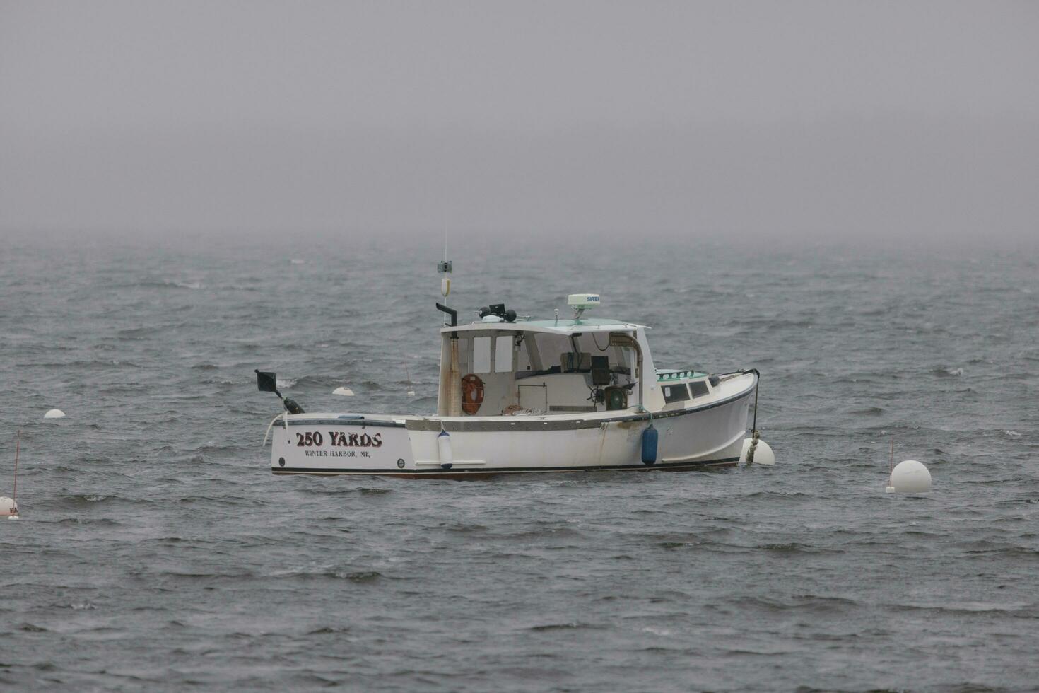 Boat on the Ocean Near Maine photo