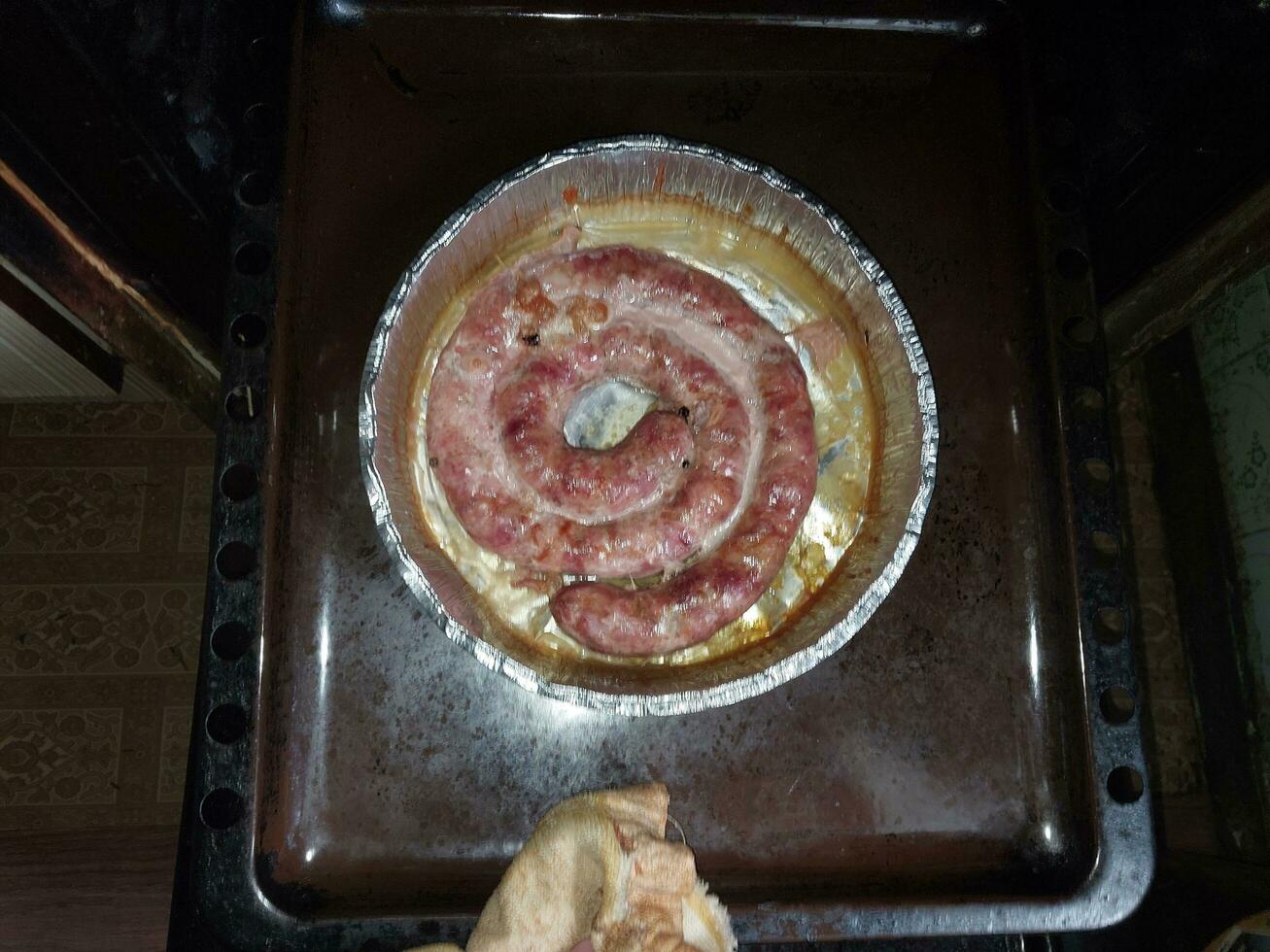 Sausage baked in the oven photo