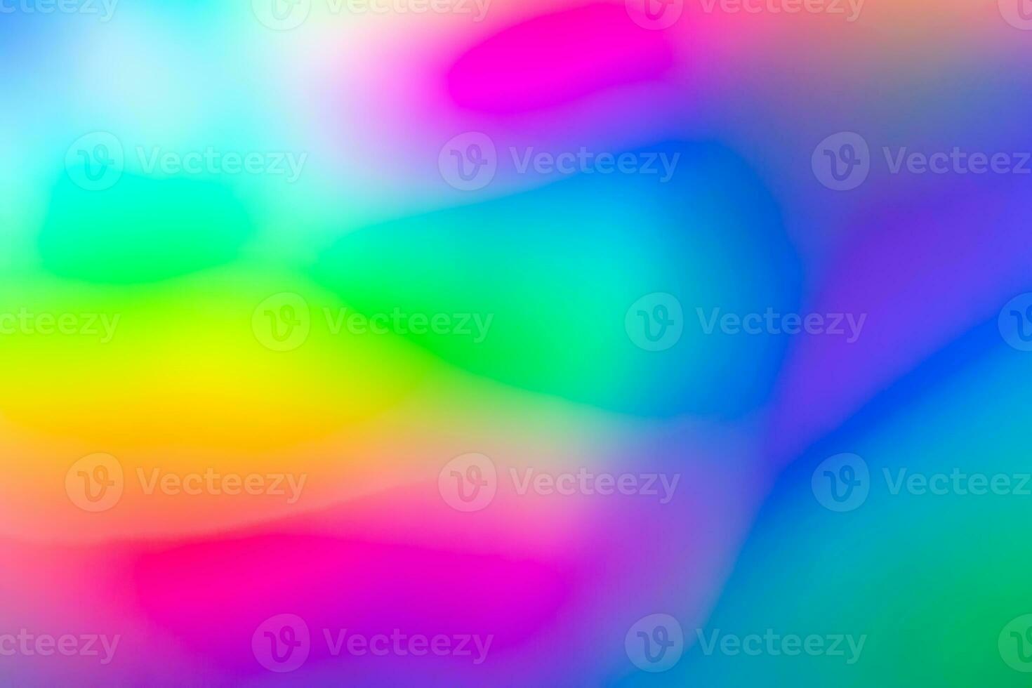 Abstract blur holographic rainbow foil iridescent background photo