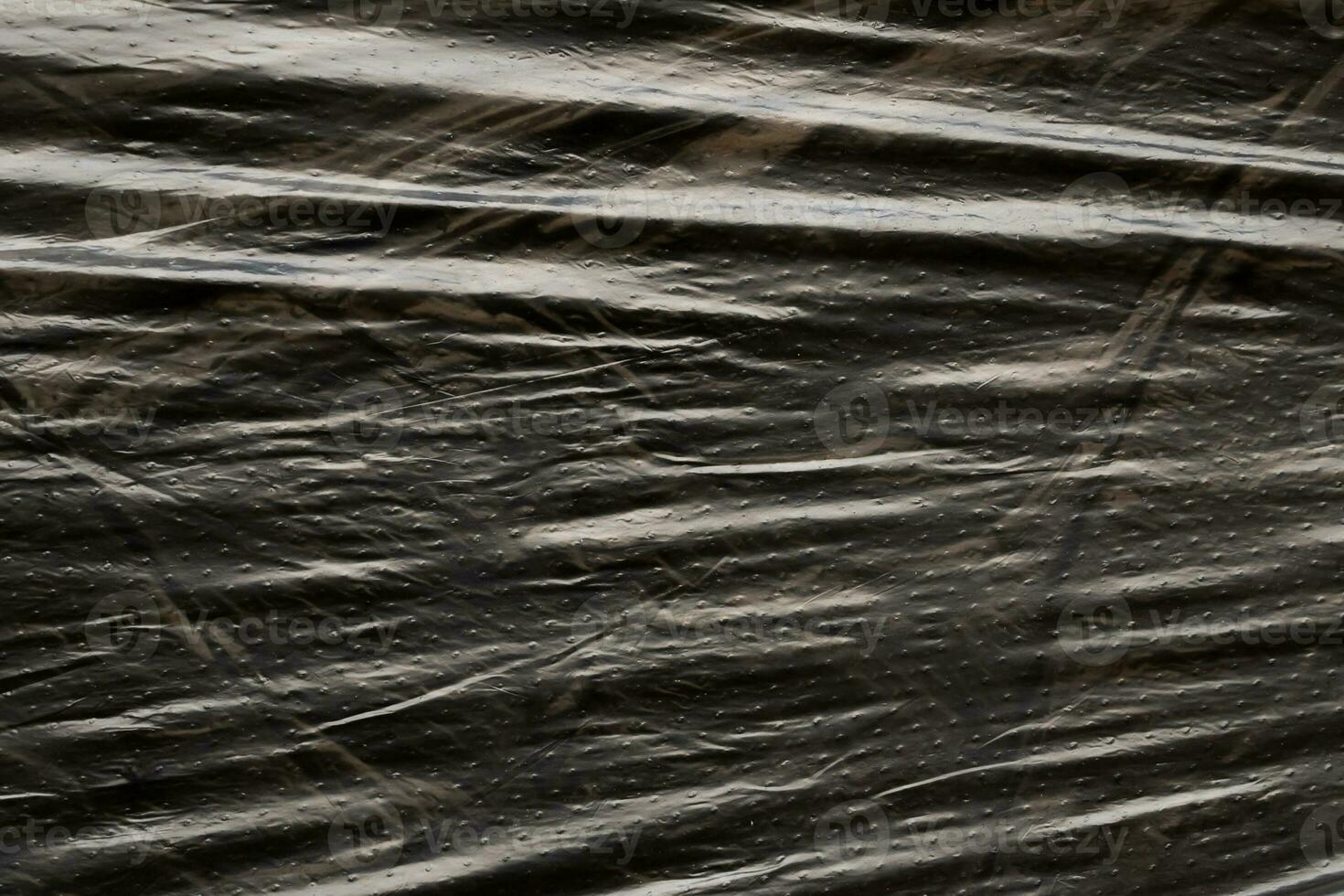 Black plastic bag texture background photo