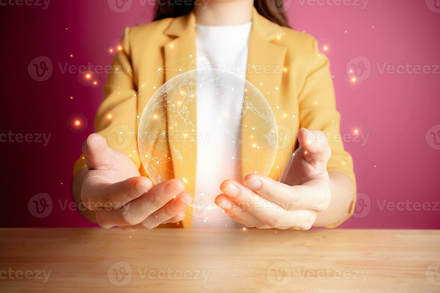 Businesswoman holding Global network connection. Big data analytics and business intelligence concept. World map point and line composition concept of global business. Digital link tech. photo