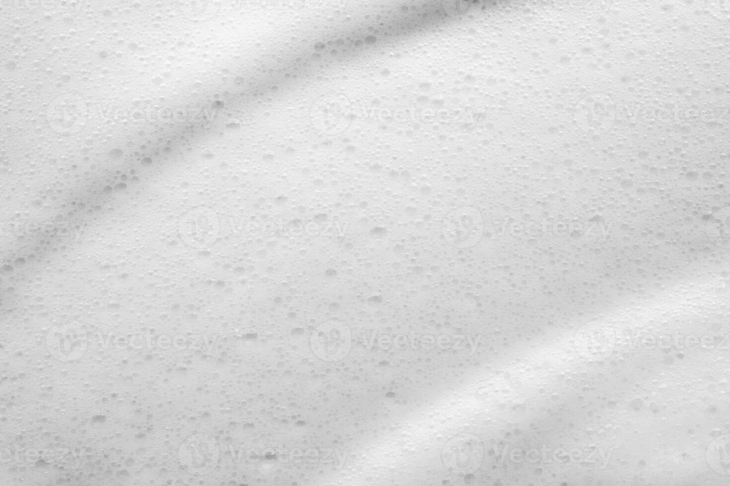 Abstract white soap foam bubbles texture background photo