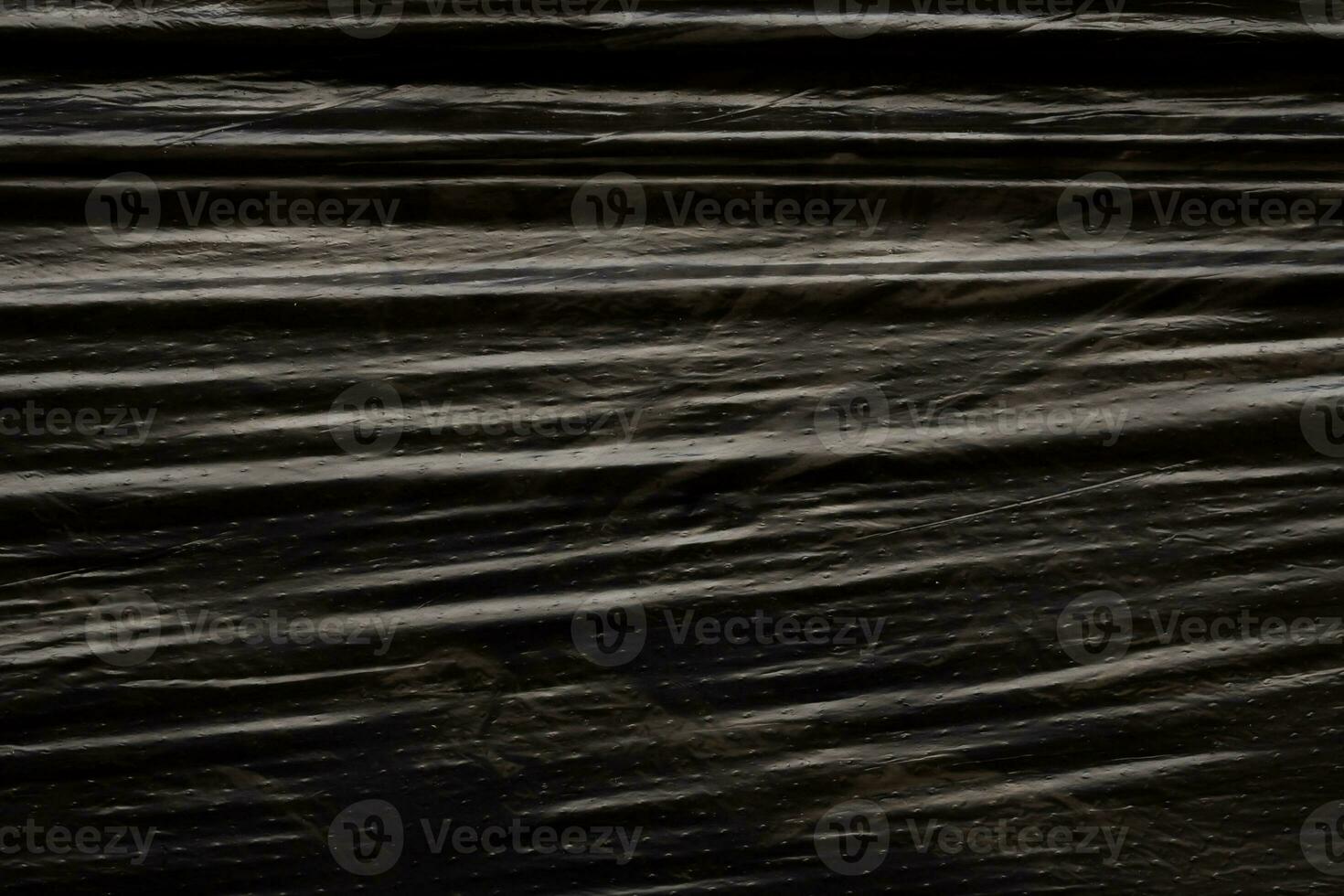 Black plastic bag texture background photo