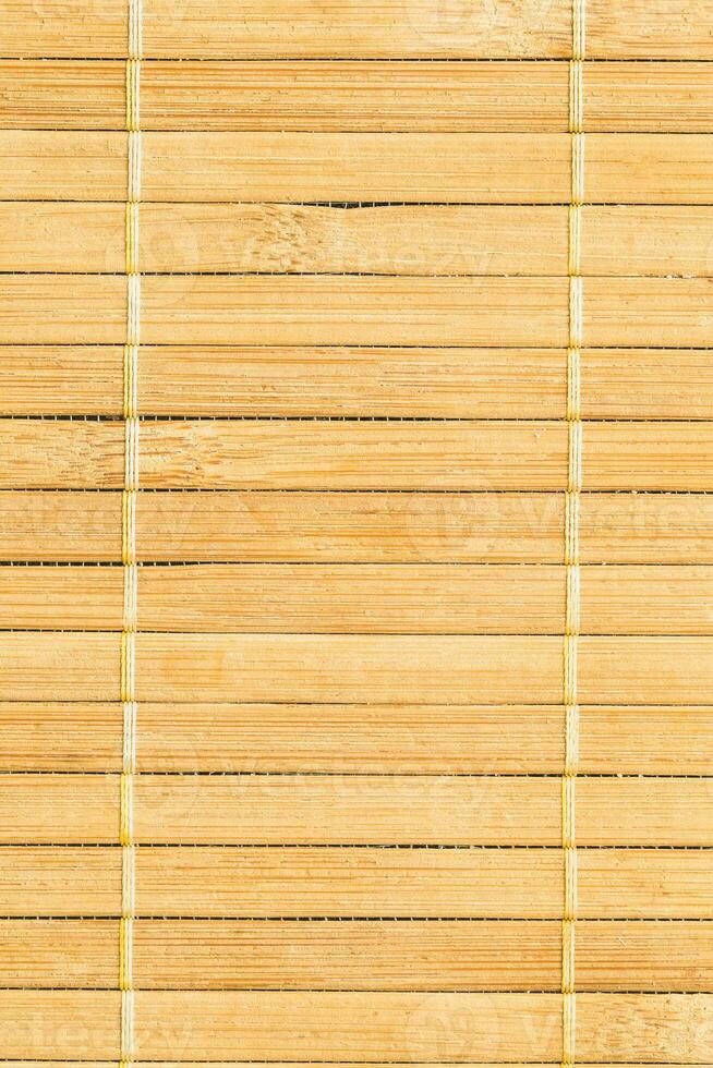 Bamboo napkin backdrop - natural background with horizontal bamboo stripes photo