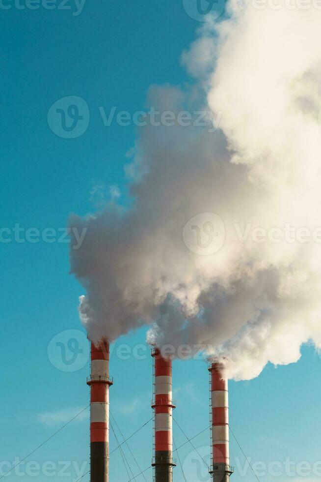 Smoke and air pollution damage the environment - harmful emissions from fuel combustion photo
