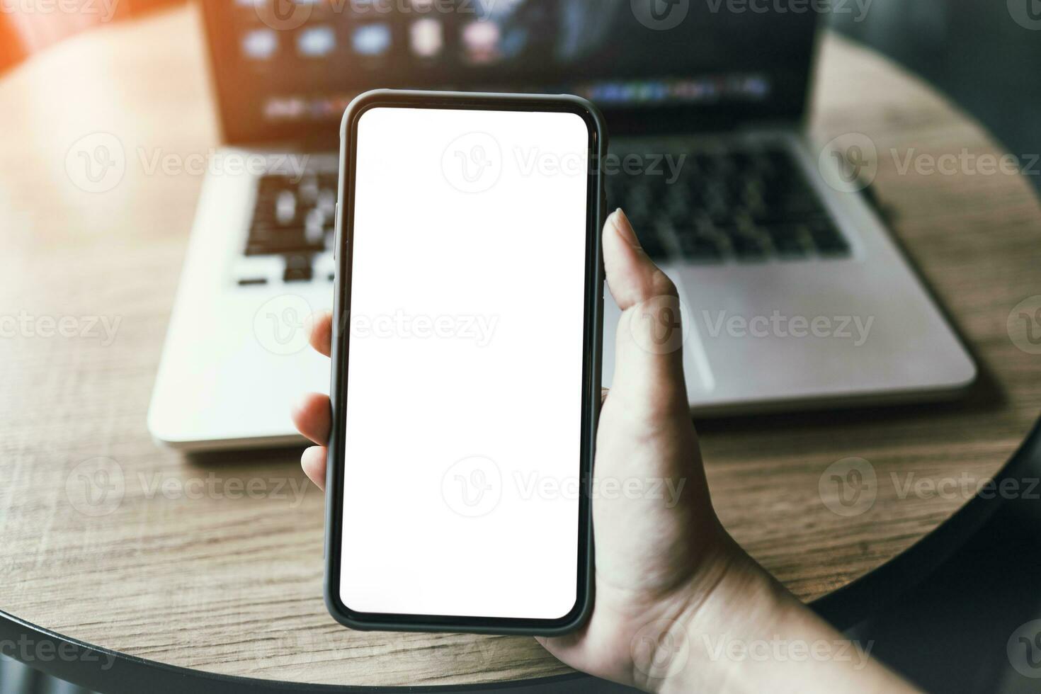 Women's hands holding cell telephone blank copy space screen. smartphone with blank white screen isolated on white background . smart phone with technology concept photo
